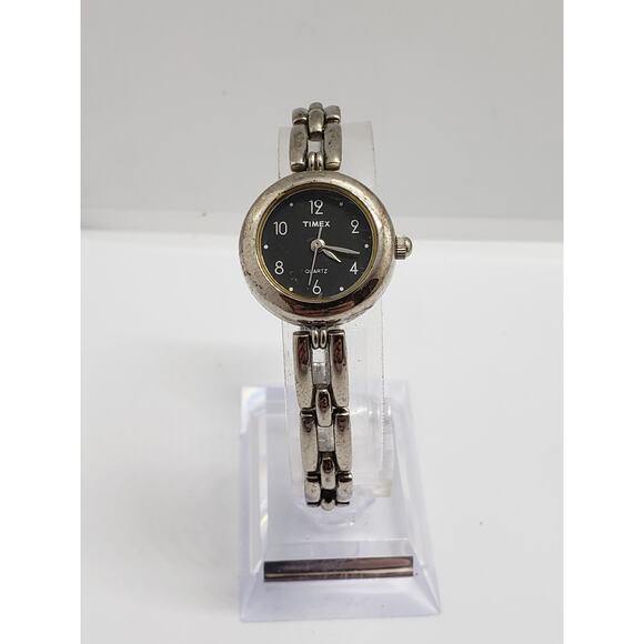 Women\'s Timex. Small black face. Bracelet style band.